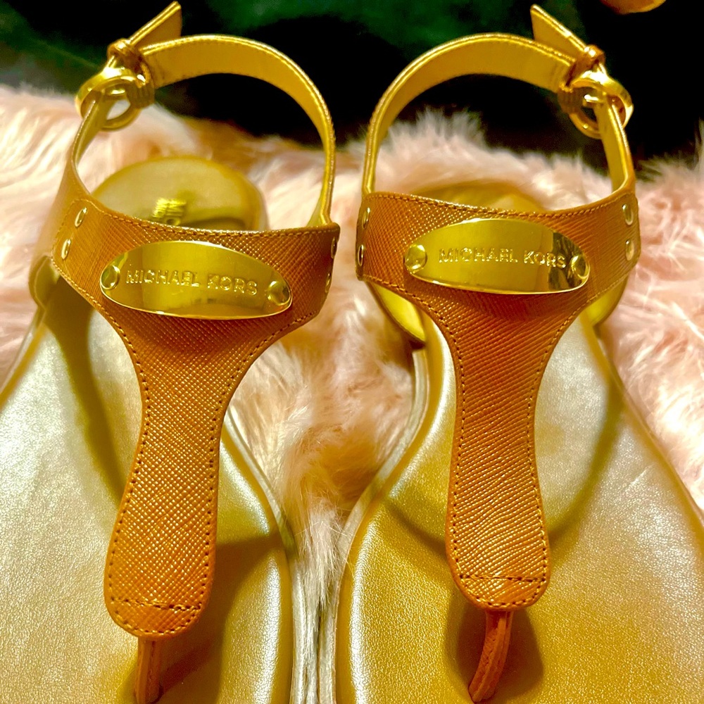 Brand new Michael Kors sandals. Never worn, perfect condition. Size 7.5